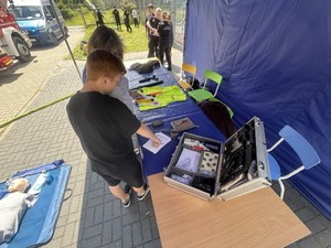 stoisko tematyczne służb mundurowych podczas festynu