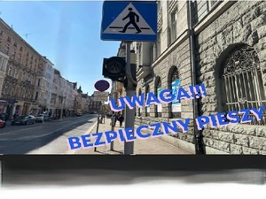 Awatar do działań &quot;Bezpieczny pieszy&quot;. Zdjęcie ul. Zwycięstwa w Gliwicach ze znakiem &quot;Przejście dla pieszych&quot; na pierwszym planie.